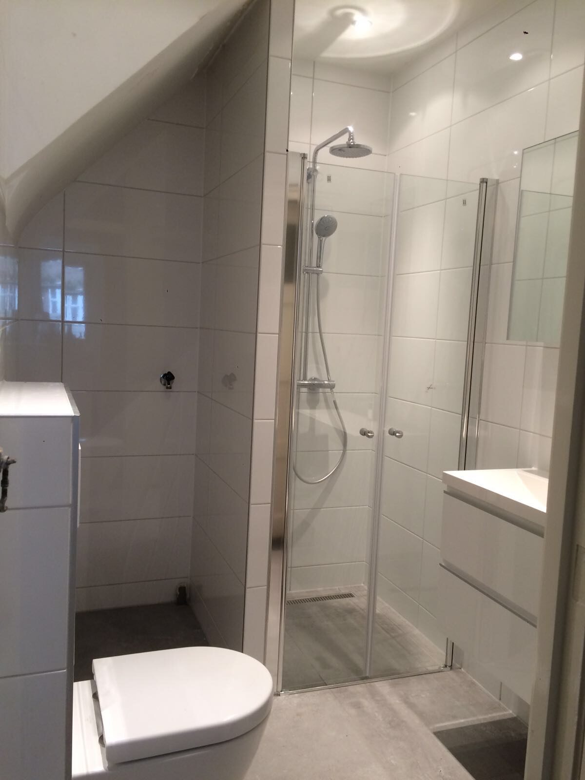 Badkamer onder schuin dak